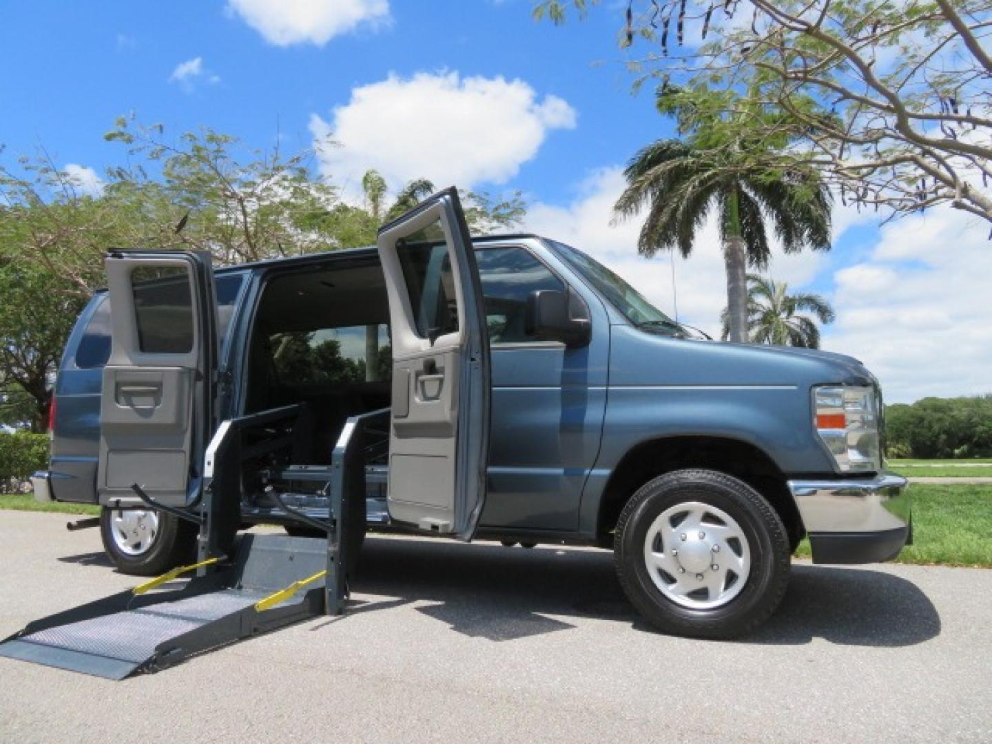 2013 Dark Blue /Gray Ford E-Series Wagon XLT (1FMNE1BW4DD) with an 4.6L V8 engine, Automatic transmission, located at 4301 Oak Circle #19, Boca Raton, FL, 33431, (954) 561-2499, 26.388861, -80.084038 - You are looking at a Gorgeous 2013 Ford E150 XLT Handicap Wheelchair Conversion Van with 22K Original Miles, Tie Down System, Power Electric VMI Side Entry Wheelchair Lift, Back Up Camera, Factory Navigation and Much Much More. This van is Awesome. This is a Nice Rust Free Van with a Clean Carfax, C - Photo#40